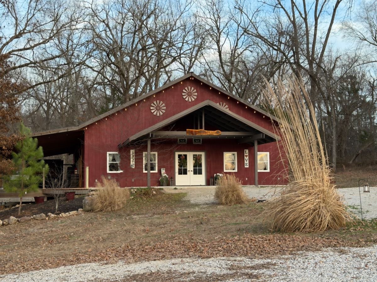 Grandpas Barn at dusk with string lights