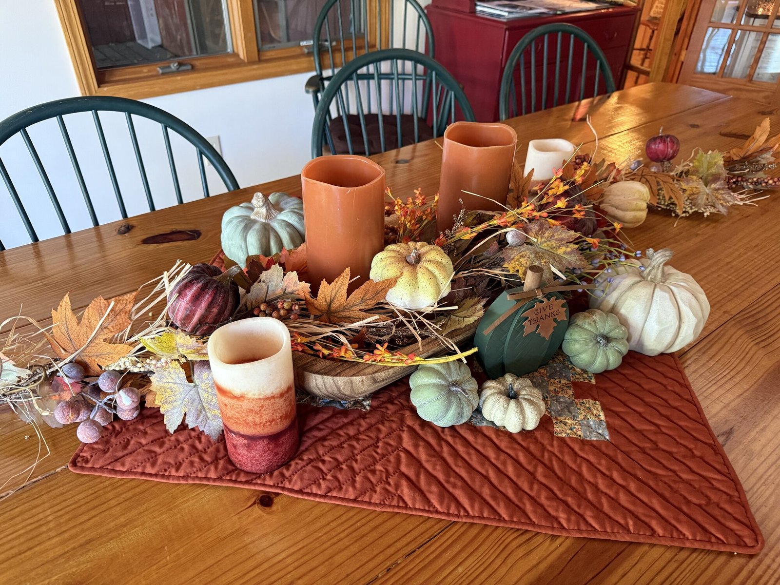 Fall table centerpiece with pumpkins in the Lodge dining room
